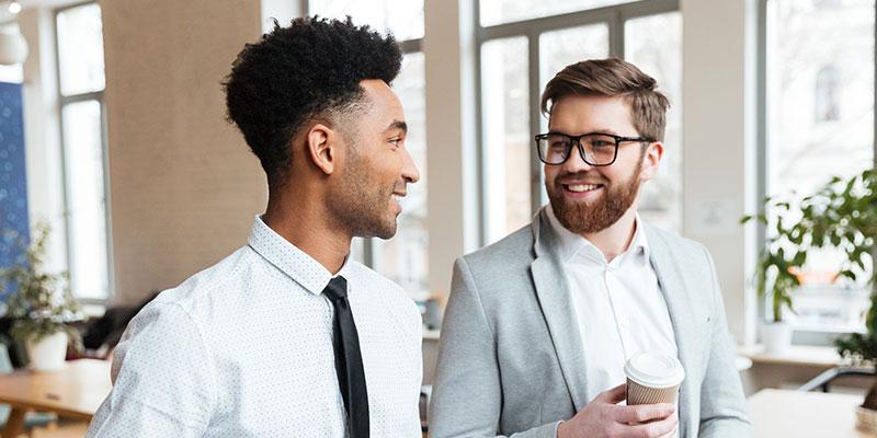 Colleagues talking to each other